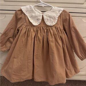 Adorable Tan Baby Dress with Embroidered Collar